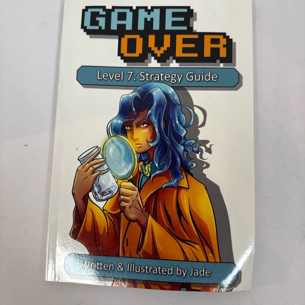 Jade Game Over Level 7 Strategy Guide with Blue and Orange Cover